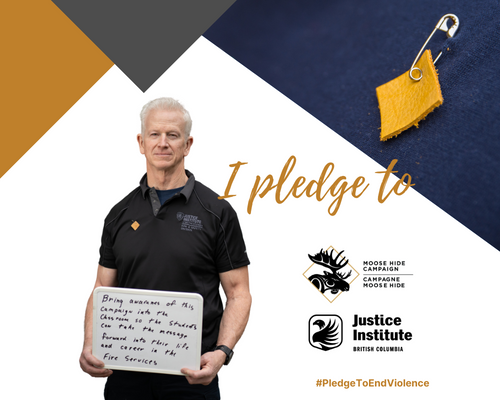 Man in black golf shirt holding sign on whiteboard against graphic of moose hide pin and "I pledge to" with logos of JIBC and Moose Hide Campaign.