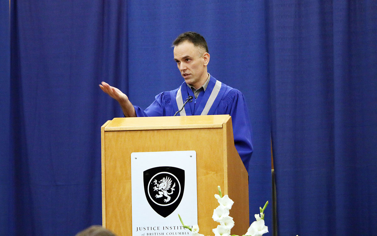 Jim Earle, a graduate of the JIBC Paramedic Academy, addresses graduates at the 2018 Winter Convocation. 