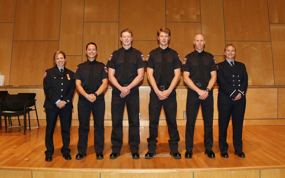 From left: Kim Saulnier, FIre Prevention Inspector at District of North Vancouver Fire & Rescue Services and JIBC lead instructor, JIBC fire graduates Ryanna Smith, Spencer Kyte, Tommy Robertson, and Douglas Race, and Jenn Dawkins of Vancouver Fire and Rescue Services, at the presentation by the 2018 One World students at JIBC's New Westminster campus.
