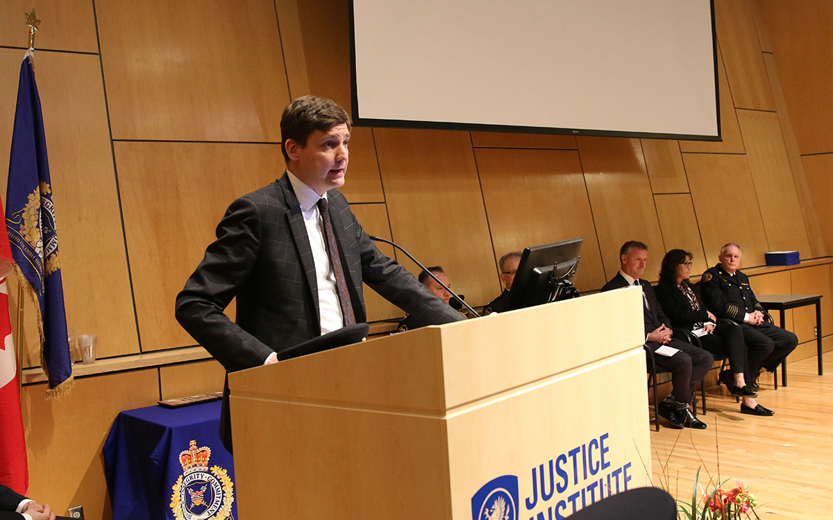 Attorney General David Eby addresses newest graduates of the JIBC Sheriff Academy.