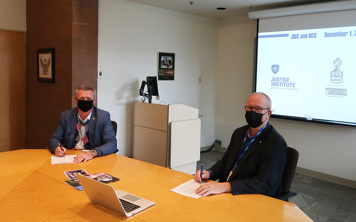 JIBC President and CEO Michel Tarko and Stu Ruttan, Dean, School of Criminal Justice & Security and Office of International Affairs, sign MOU with Security Sciences University of Nuevo Leon State. 