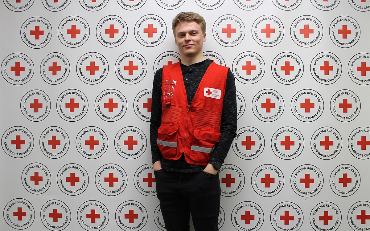 Josh Windsor against Canadian Red Cross backdrop.