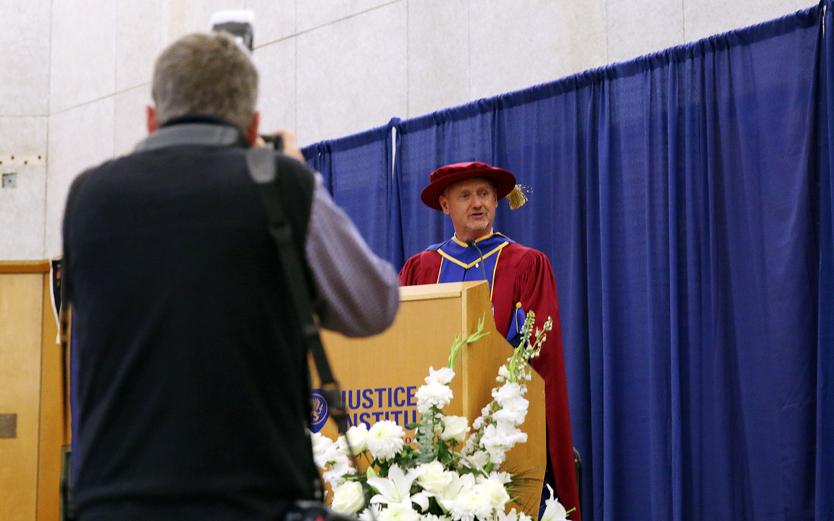 JIBC President and CEO Dr. Michel Tarko addresses the graduating class at the 2022 Spring Convocation ceremony.