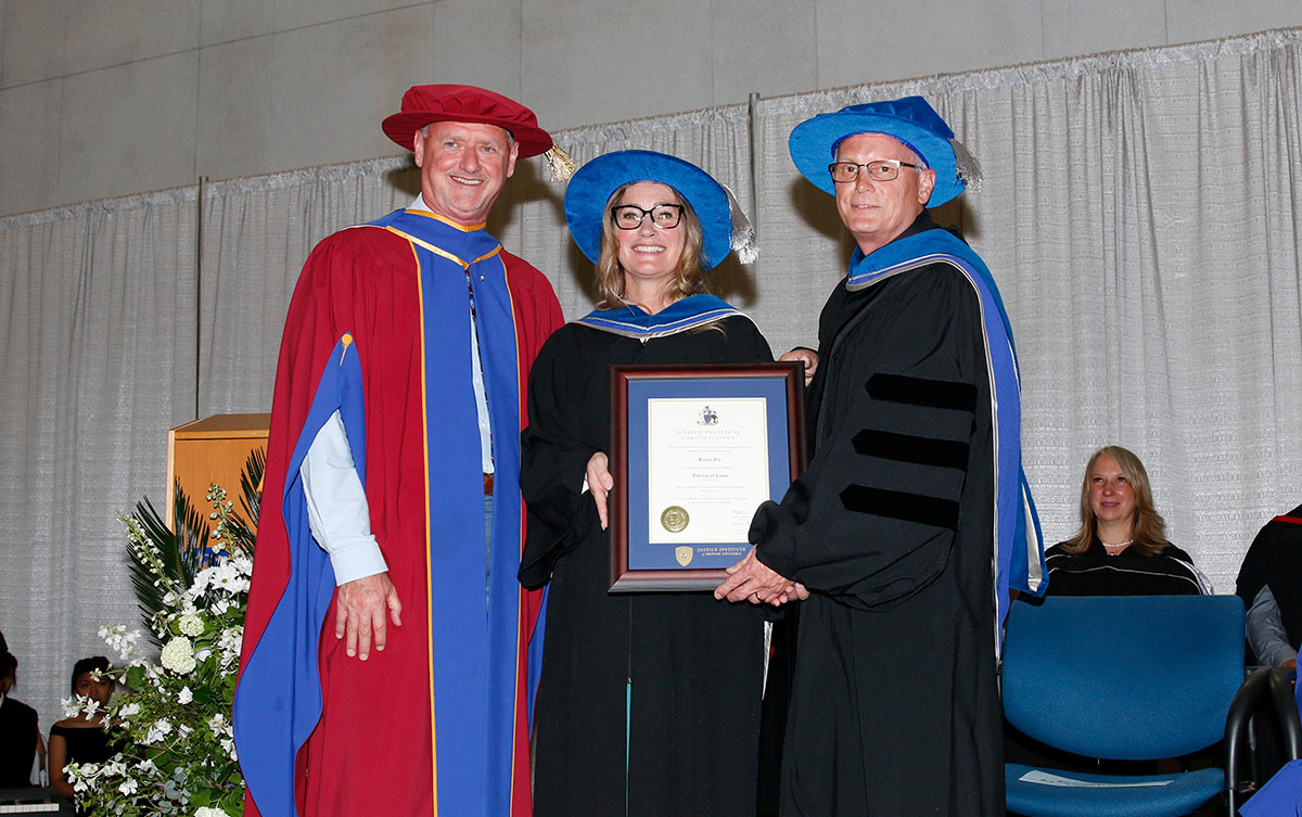 JIBC President and CEO Dr. Michel Tarko and JIBC Board Chair Dr. Stephen Gamble with honorary degree recipient Dr. Karen Fry, Chief of Vancouver Fire and Rescue. 