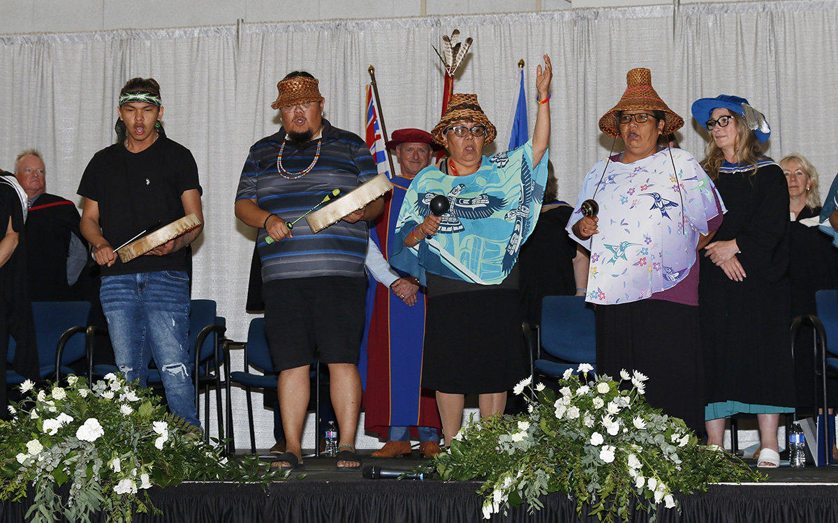 Katzie First Nation Singers perform a Traditional Welcome by way of song at the 2023 convocation ceremony. 