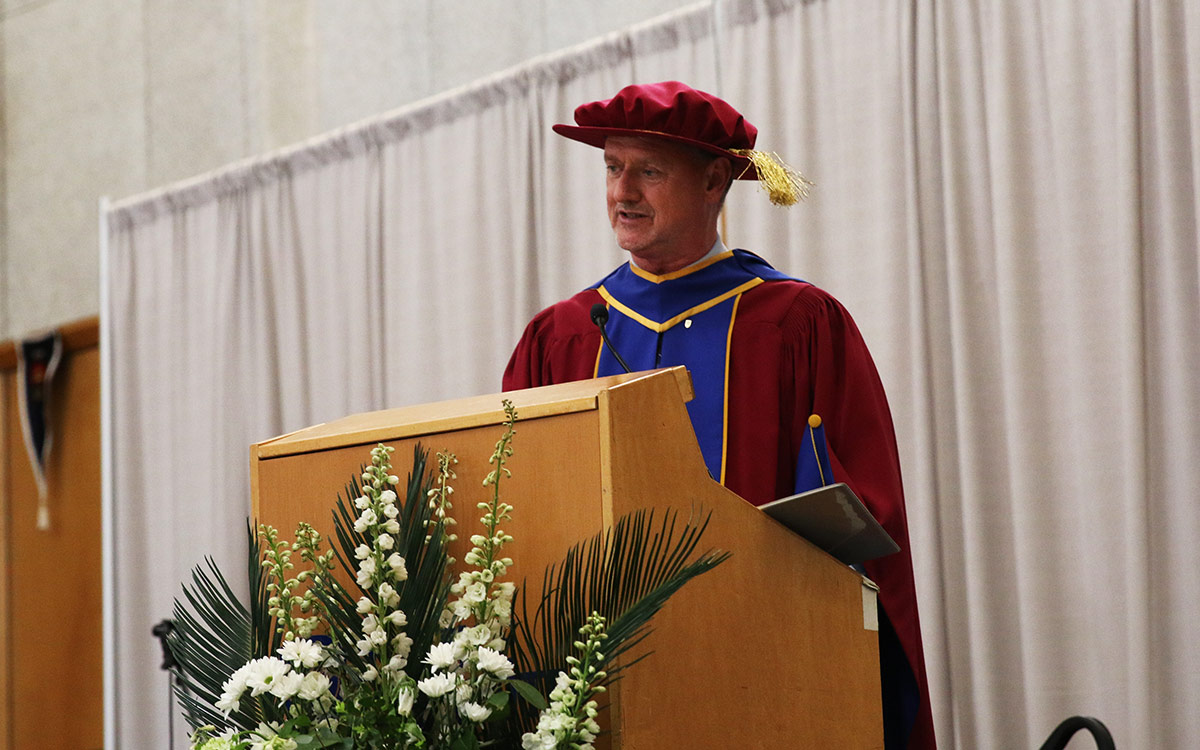 JIBC President and CEO Dr. Michel Tarko addresses the 2023 graduating class.