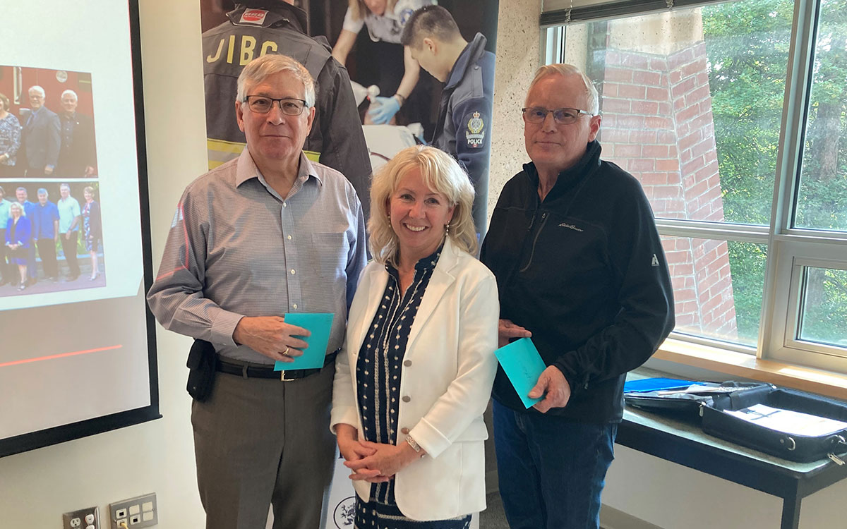 JIBC Foundation Chair Kathy Wunder with former Vice-Chair John Oakley, left, and former Foundation Board member Stephen Gamble.
