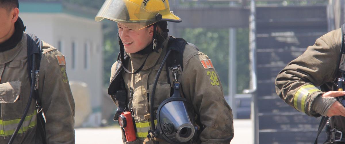 A year after completing the Fire Fighting Technologies Certificate program at JIBC, Ashley Long was promoted to a career firefighter position with a local fire department.