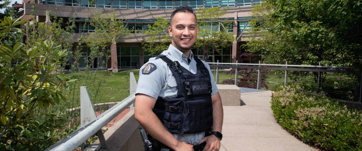 Two years after graduating from JIBC, Mansoor Sahak was hired as an RCMP officer, a role he hopes will help him to give back to Canada for taking in his family as refugees.