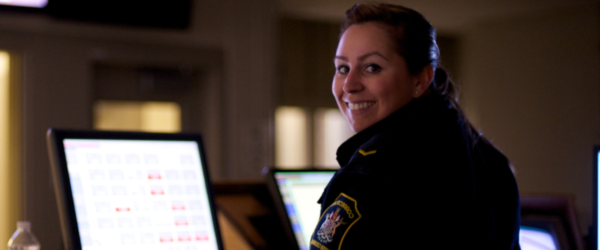 Officer working at laptop