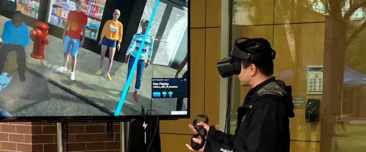 A student performing simulation demonstration