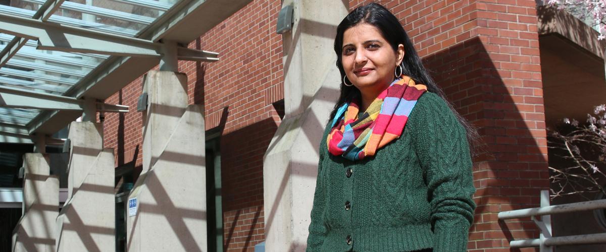 Sanna Meherally stands outside entrance to New Westminster campus.