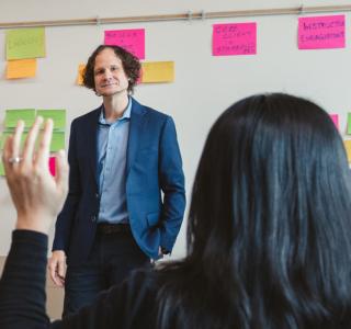 JIBC instructor and students in a classroom