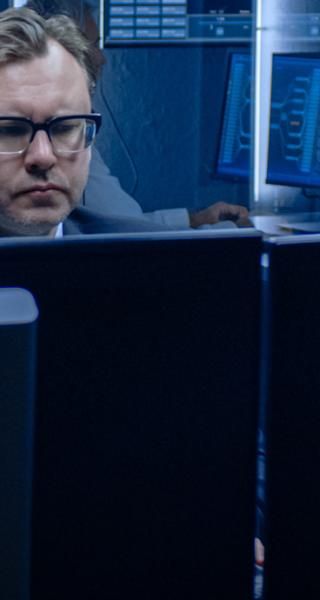 Person analyzing data on a computer