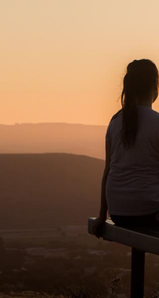 Complex Trauma image of a girl at a sunset