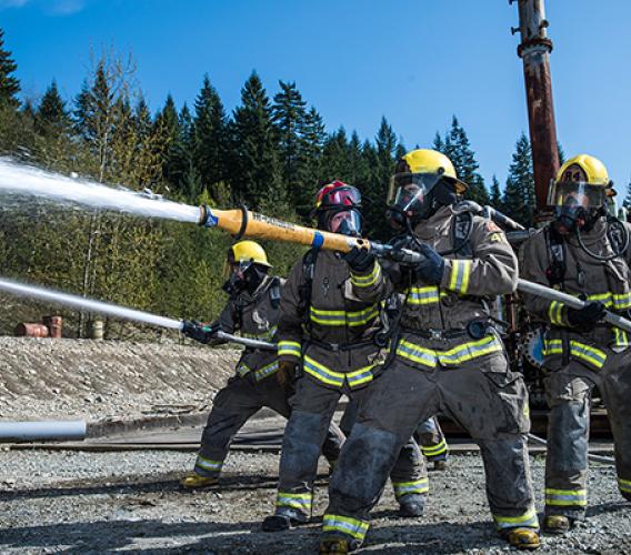 JIBC firefighting students at training