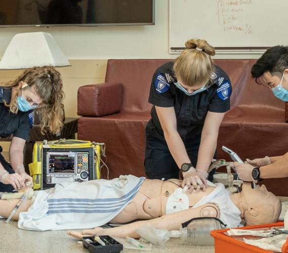 Advanced Care Paramedic students practising.