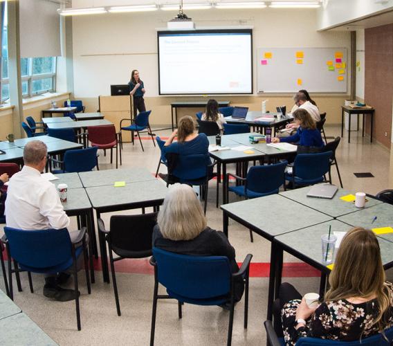 Wide view of students in a classroom.