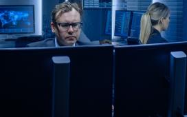 Person analyzing data on a computer