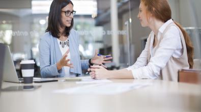 A boss and an employee in a meeting