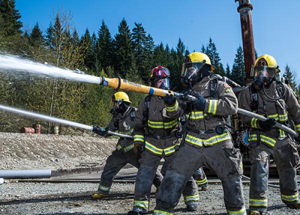 JIBC firefighting students at training