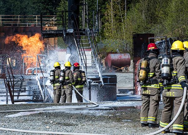 JIBC firefighting students at training