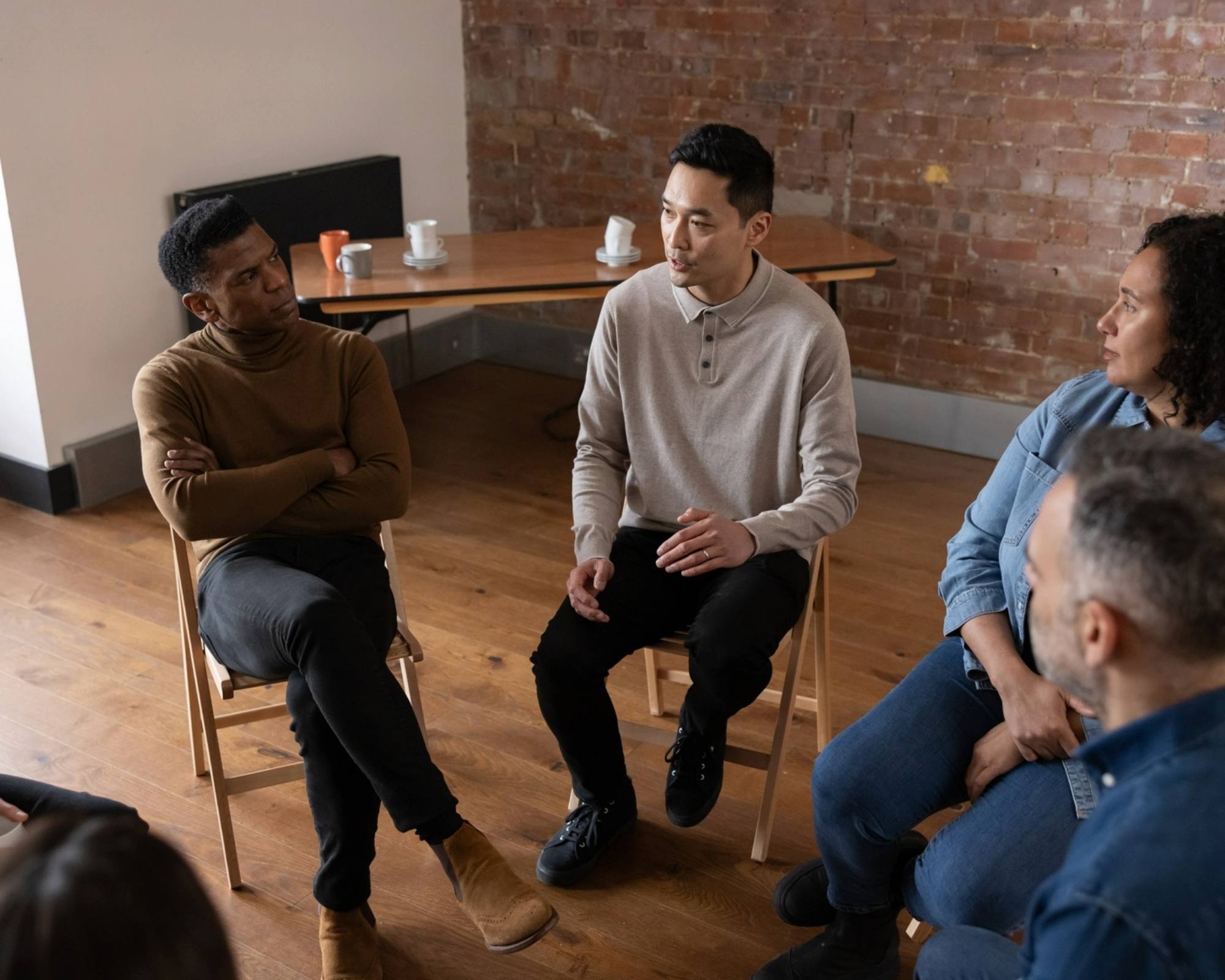 group of people sitting in a room